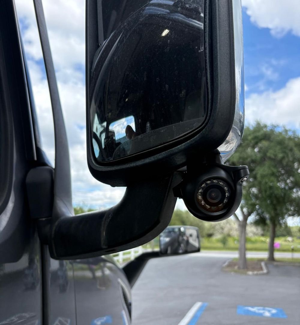 Side camera installed on a work truck mirror